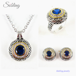 Sobling antique bali style designer inspired jewelry set with lotus blossom patterns and round ruby