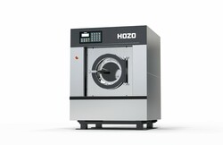 Shock-absorbing automatic washer extractor for extended machine life