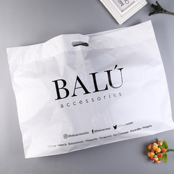 Reusable plastic die cut patch handle shopping carrier bags