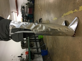 Aluminized Chaps cover the full leg, expose the buttock area, velcro closure side view