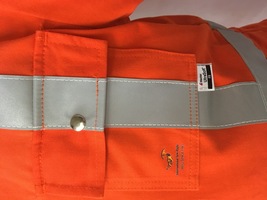 Arc Flash Hi Vis Coverall with 2 inch FR Tape, front pocket with flap double stitched and reinforced